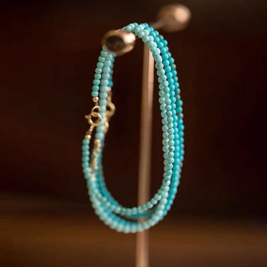 Schutzarmband mit natürlichen türkisfarbenen Perlen – Buddha Power Store